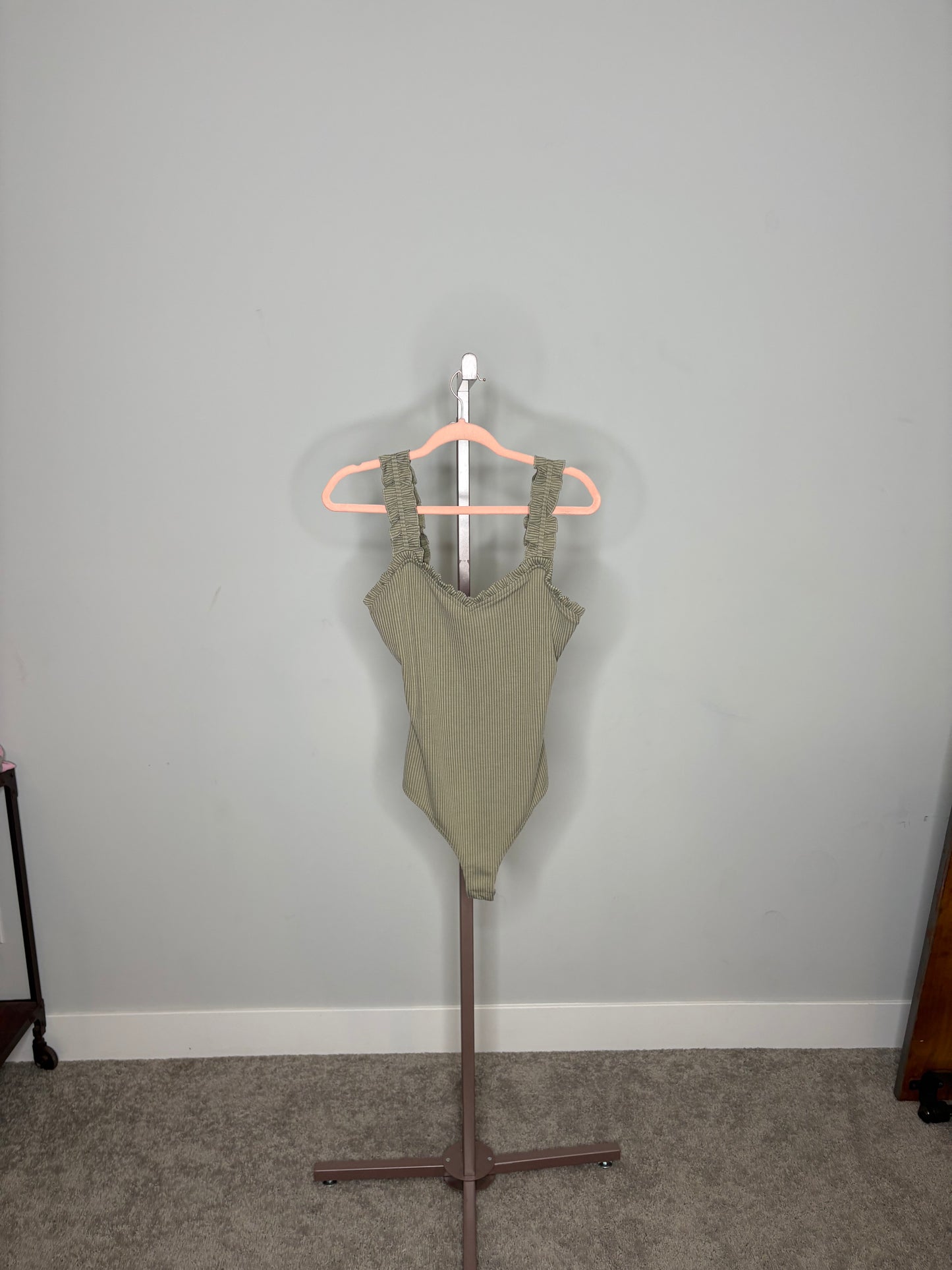green bodysuit