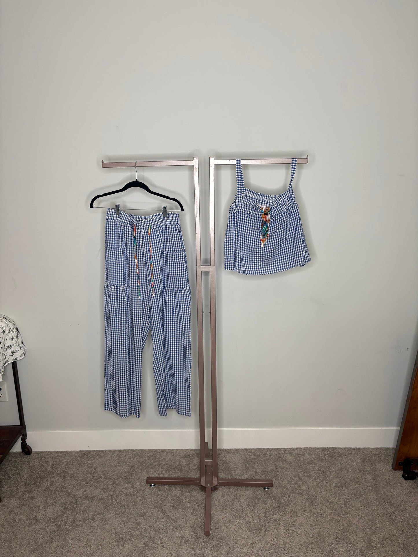 blue and white pants and top set