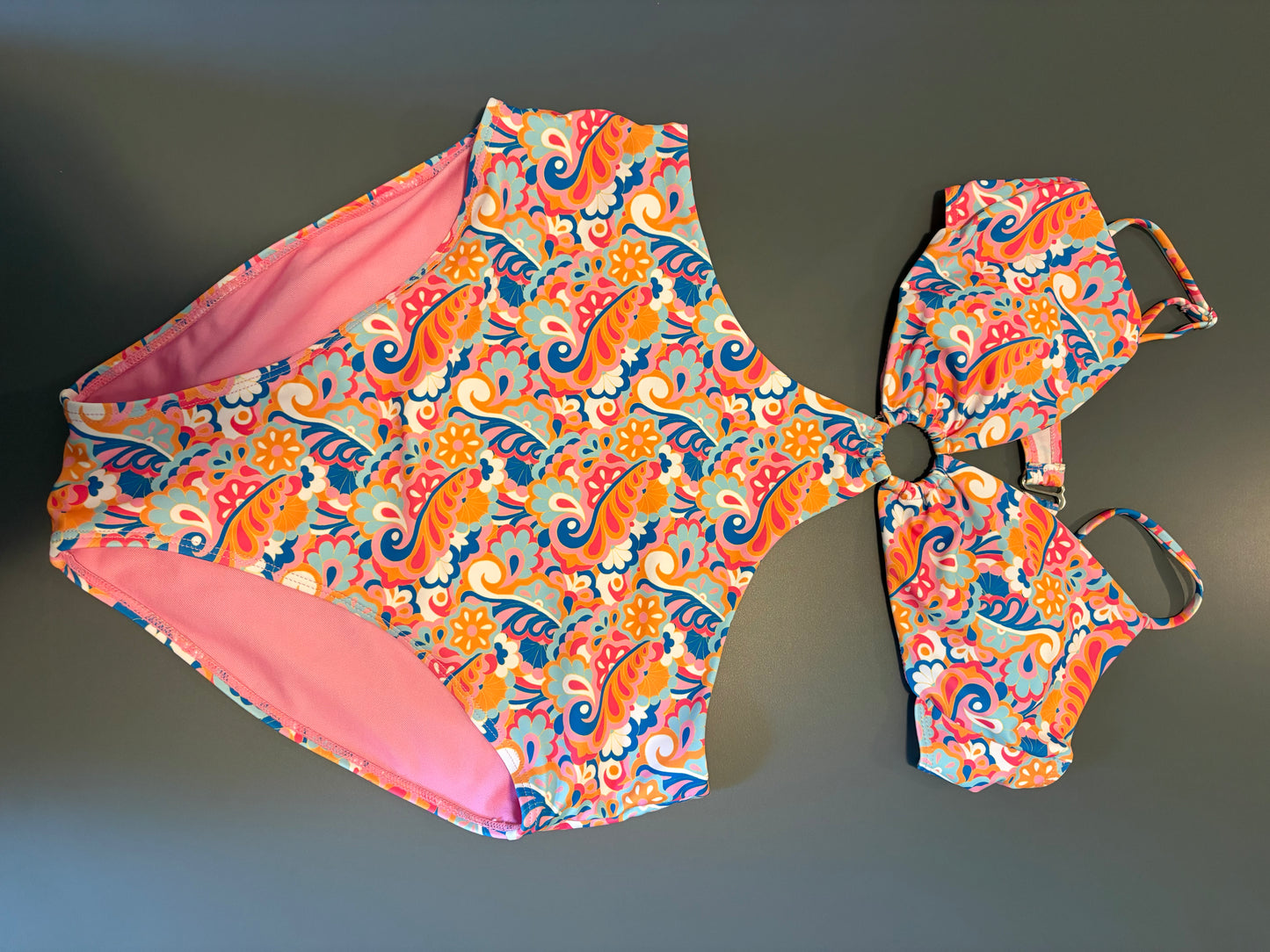 pink multicolor monokini bathing suit with open back