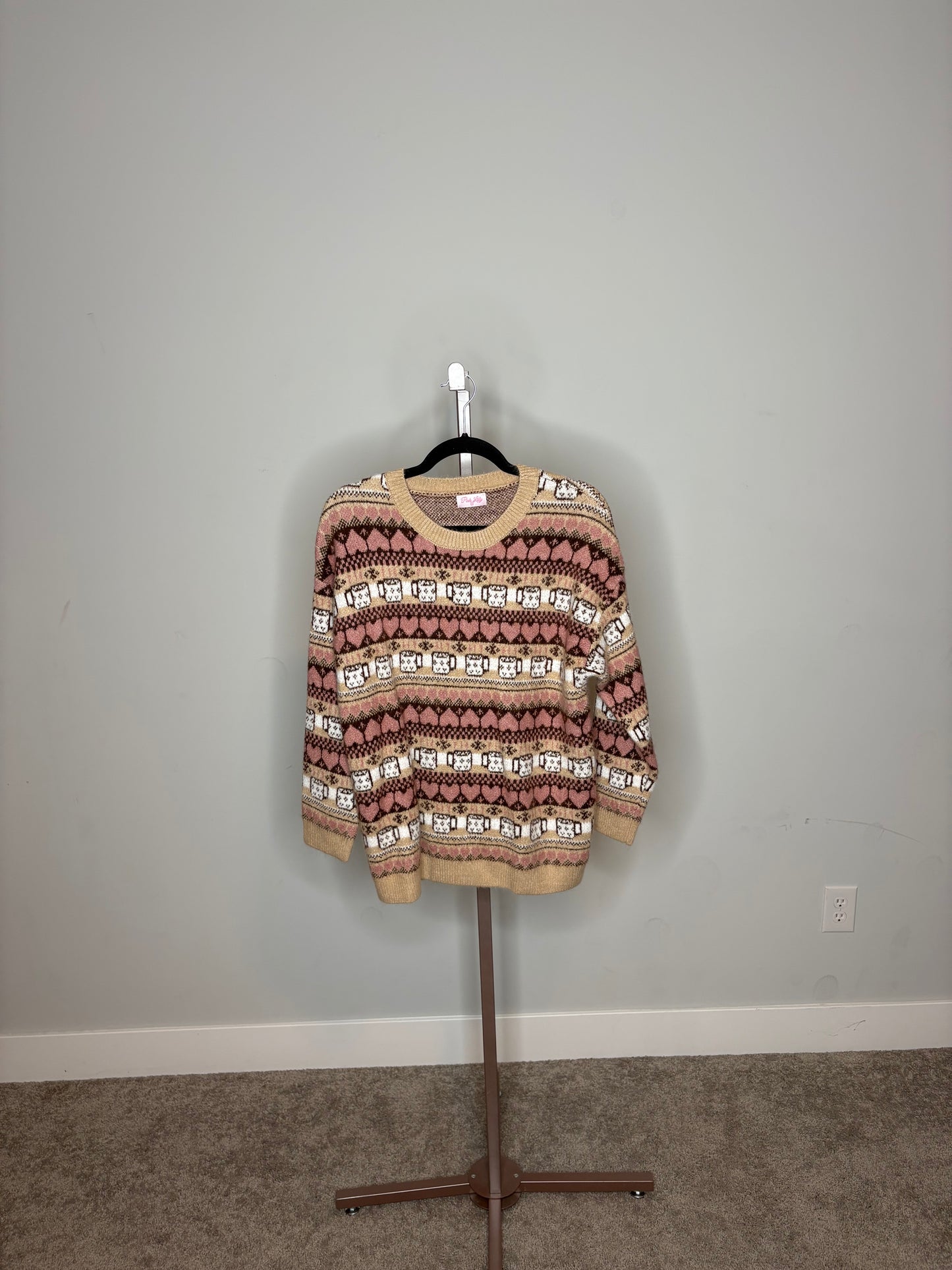 tan black and pink coffee sweater