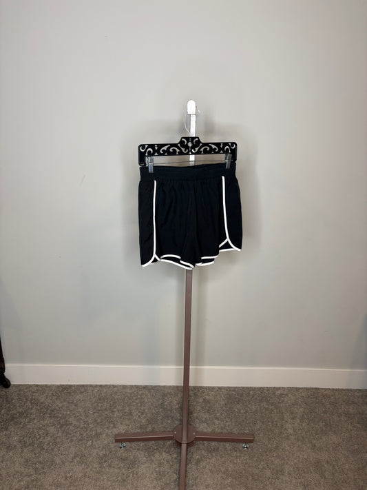 black sports shorts with white stripes