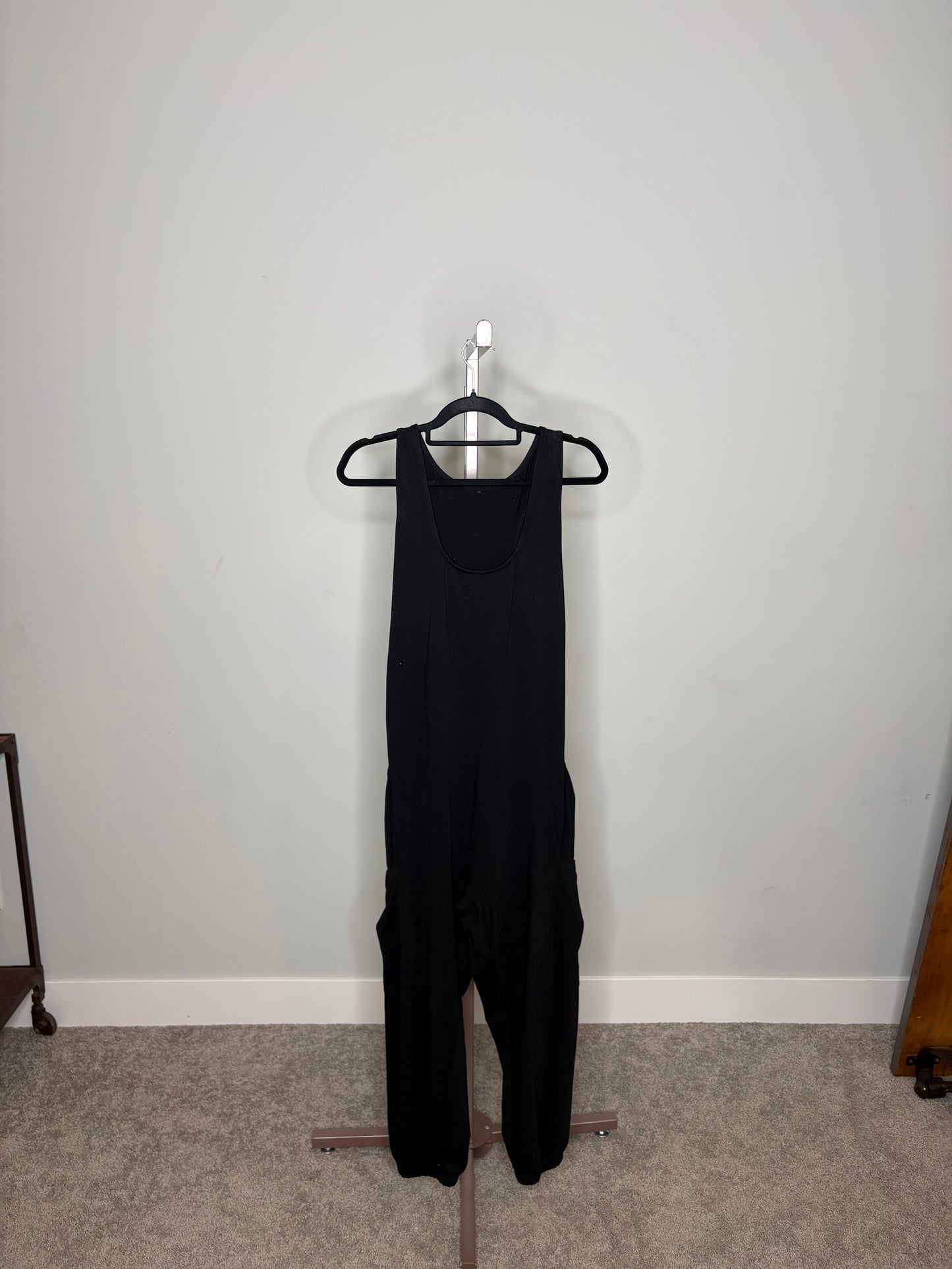 Black sleeveless jumpsuit