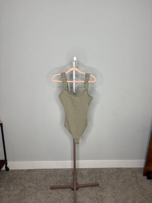 green bodysuit