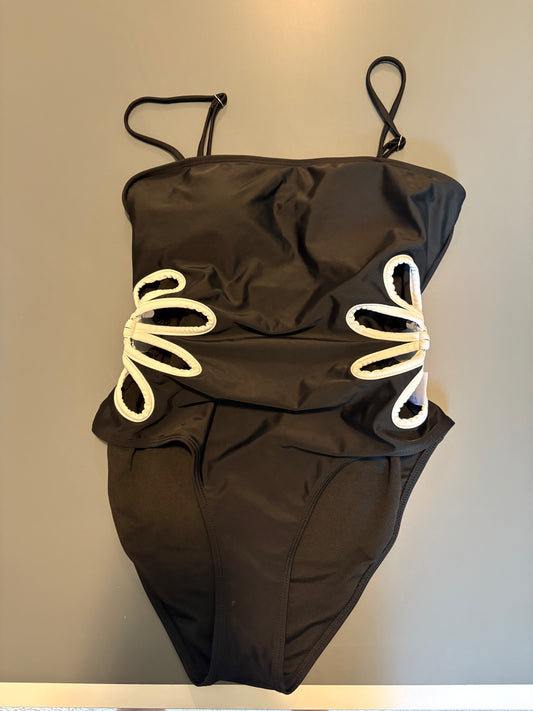 black one piece bathing suit with cutout white accents
