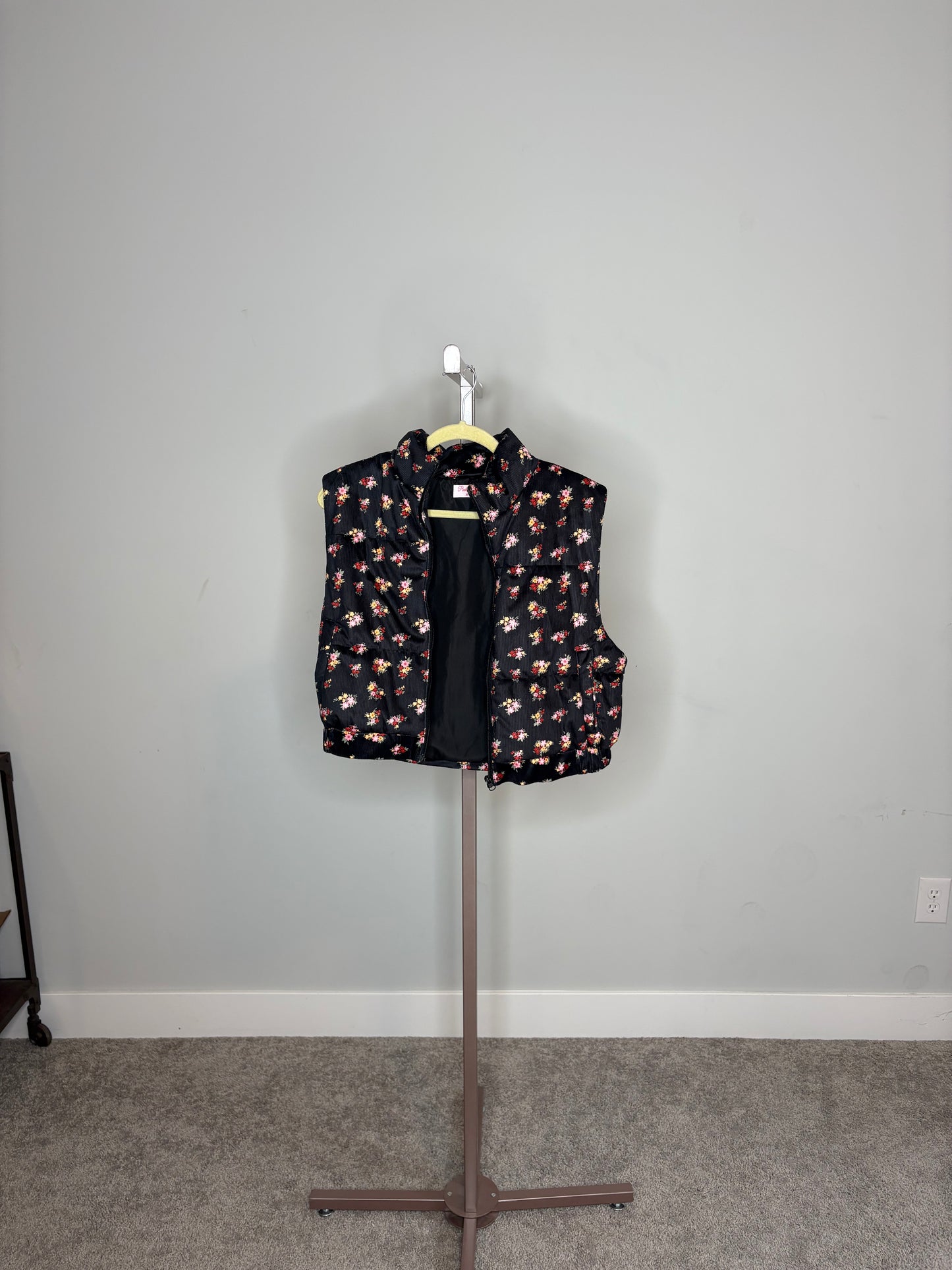 black corduroy vest with floral design