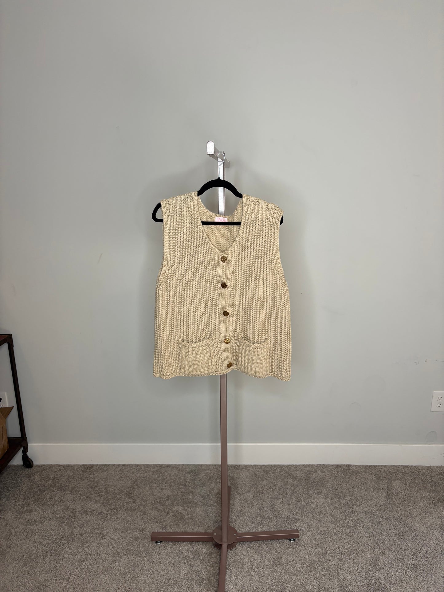brown sweater vest
