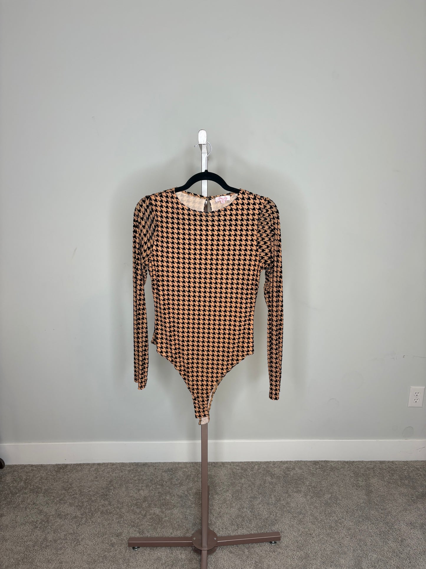 brown and black houndstooth bodysuit