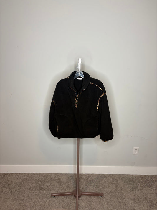 black sweater qaurter zip with cheetah print outline