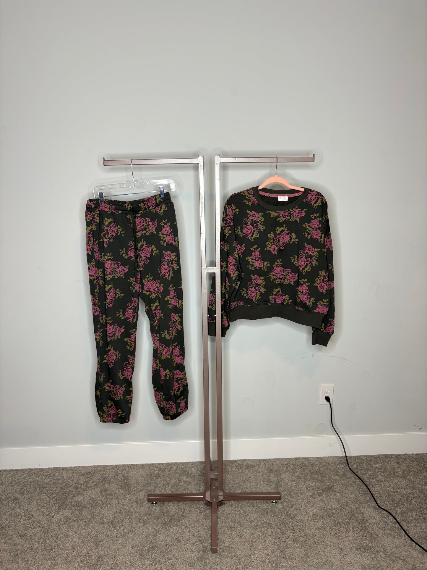 green sweatsuit set with pink floral design